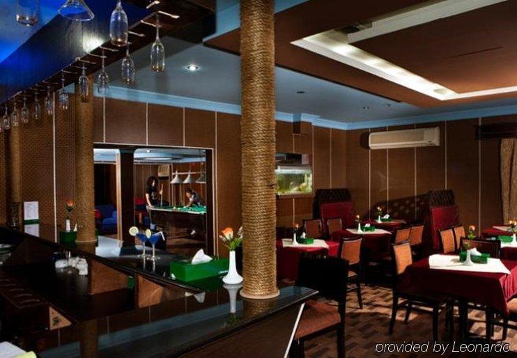 Concord International Hotel Manama Restaurante foto