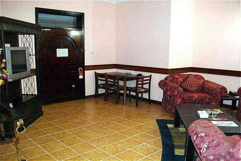 Concord International Hotel Manama Quarto foto