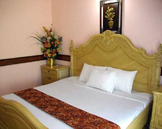 Concord International Hotel Manama Quarto foto